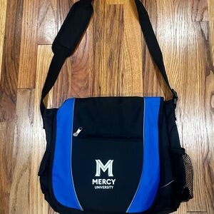 Mercy University Black and Blue Crossover‎ bag. Never used